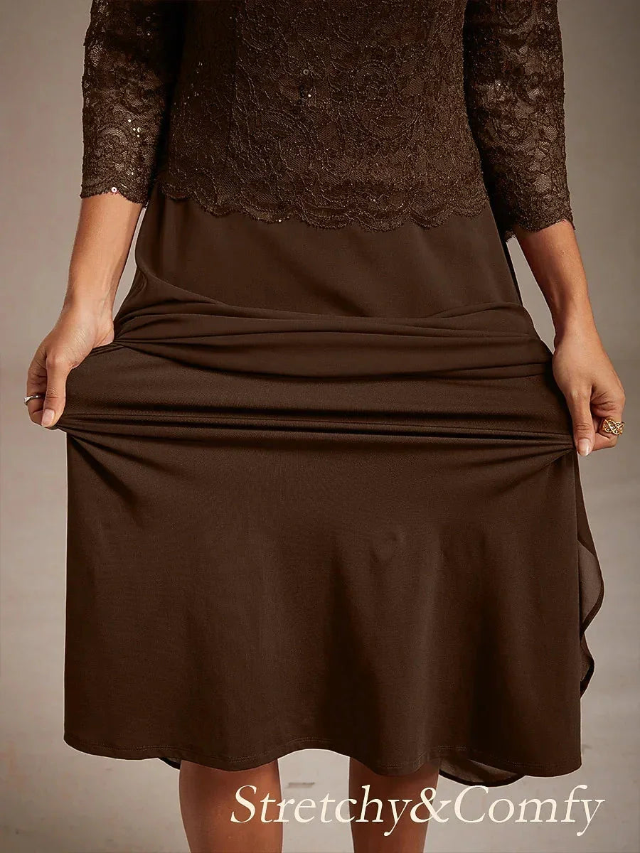 Vestido midi con encaje y manga tres cuartos