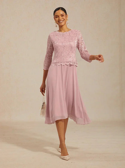 Vestido midi con encaje y manga tres cuartos