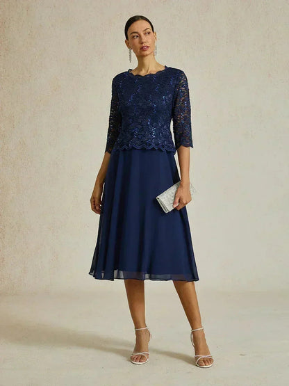 Vestido midi con encaje y manga tres cuartos