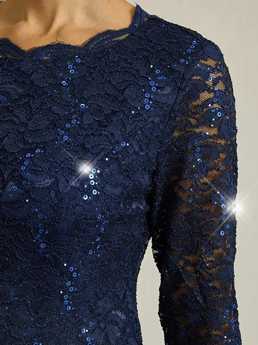 Vestido midi con encaje y manga tres cuartos