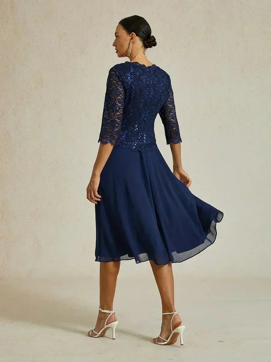 Vestido midi con encaje y manga tres cuartos