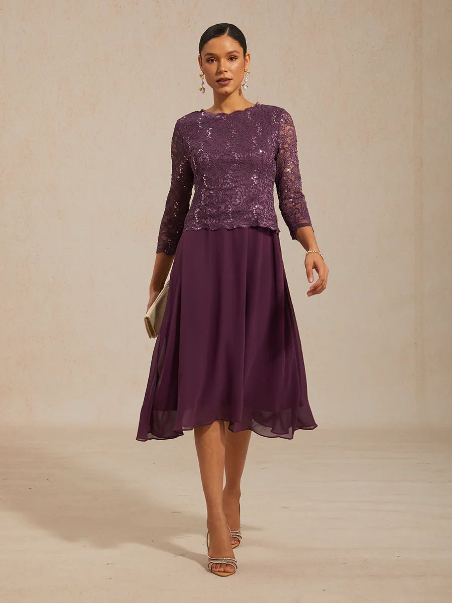 Vestido midi con encaje y manga tres cuartos