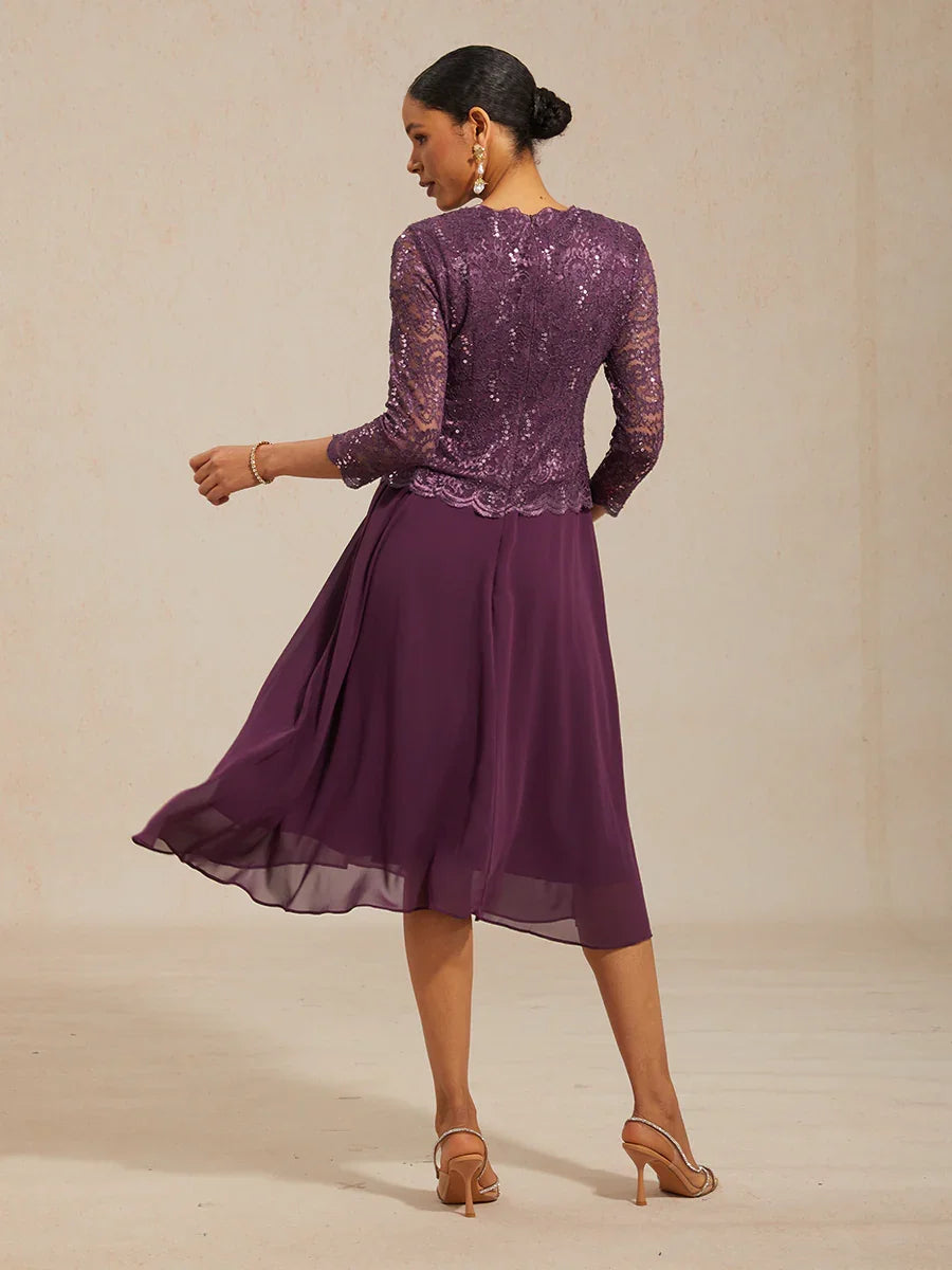 Vestido midi con encaje y manga tres cuartos