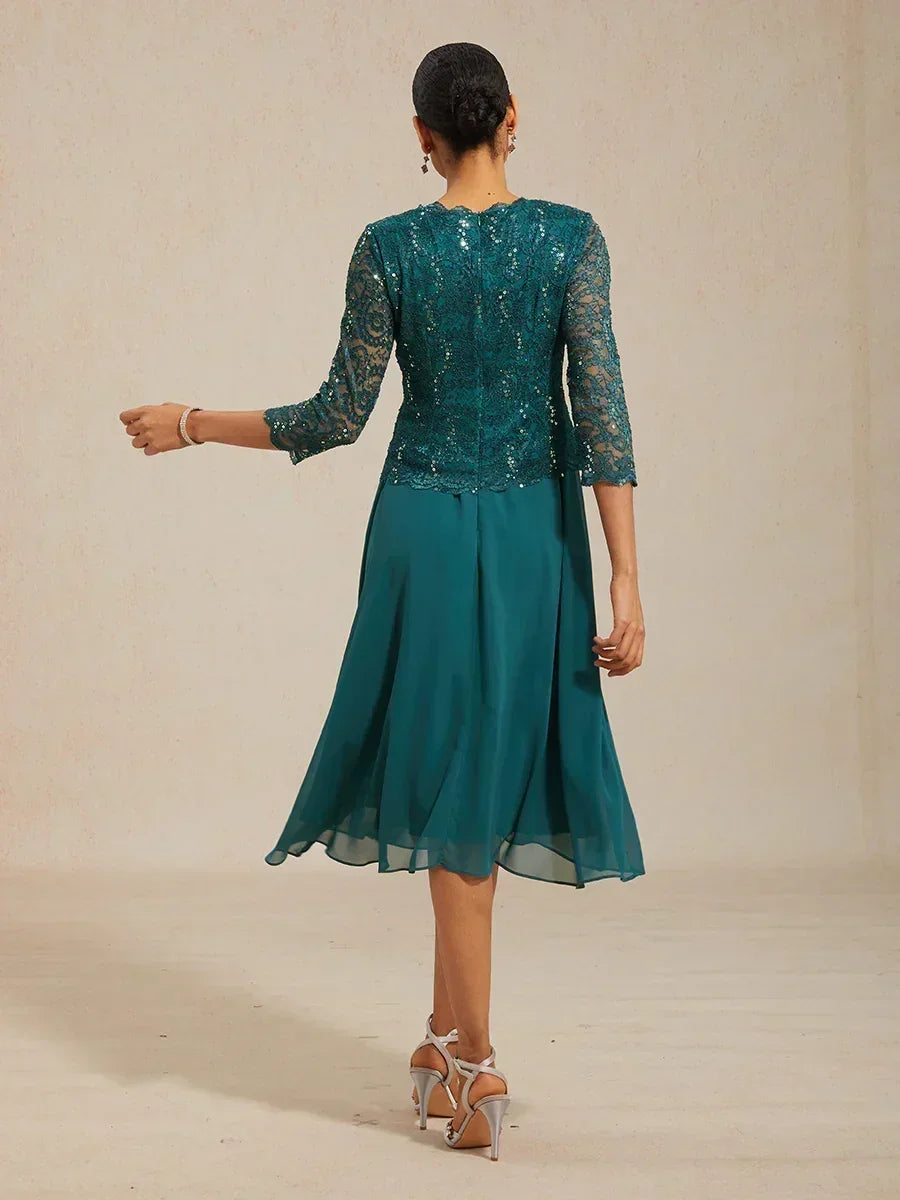 Vestido midi con encaje y manga tres cuartos