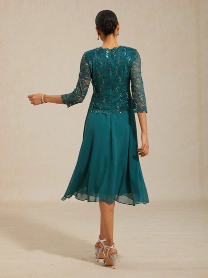 Vestido midi con encaje y manga tres cuartos