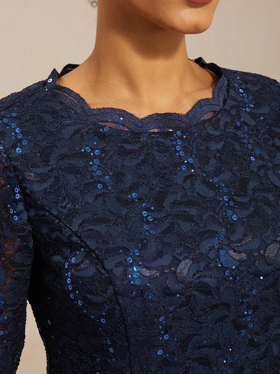 Vestido midi con encaje y manga tres cuartos