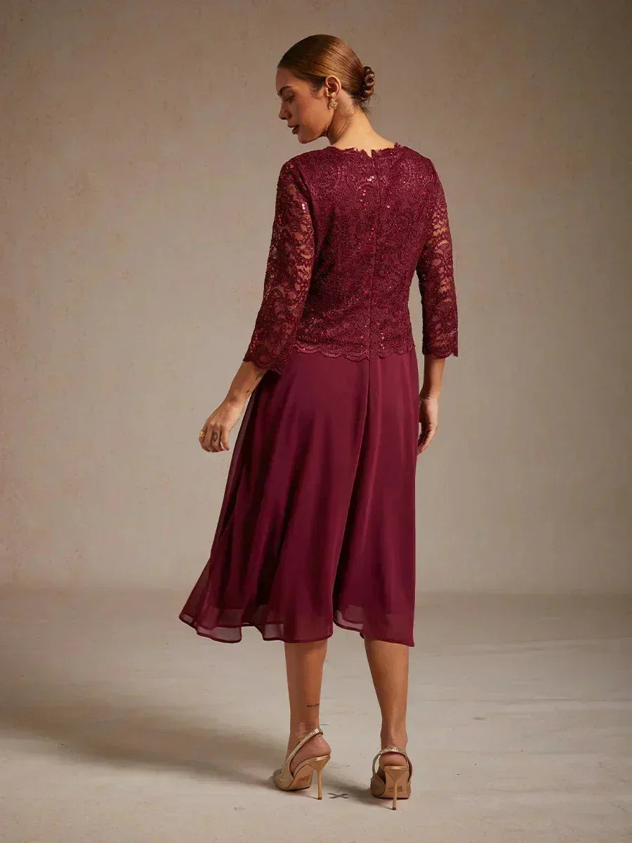 Vestido midi con encaje y manga tres cuartos