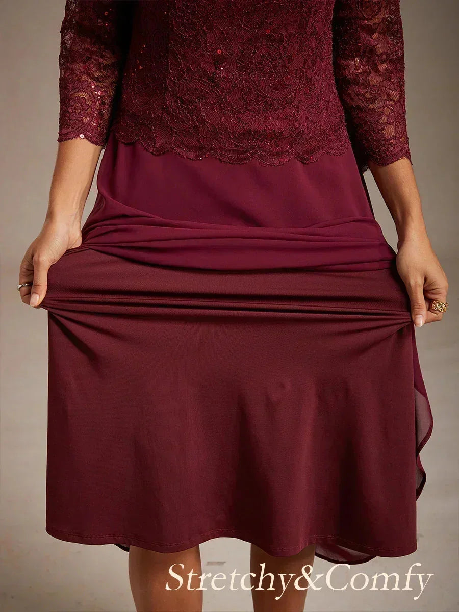Vestido midi con encaje y manga tres cuartos