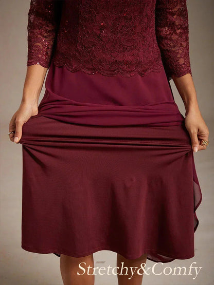 Vestido midi con encaje y manga tres cuartos