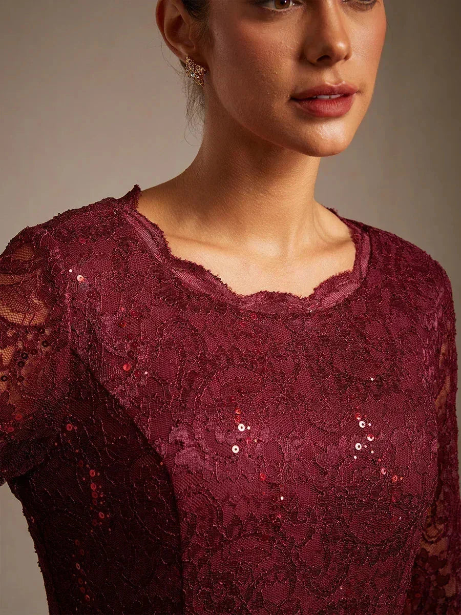 Vestido midi con encaje y manga tres cuartos