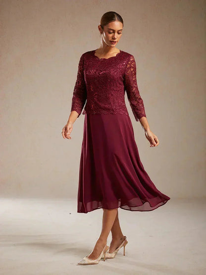 Vestido midi con encaje y manga tres cuartos