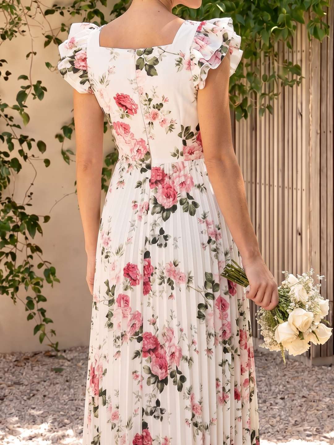 Vestido midi floral plisado con volantes