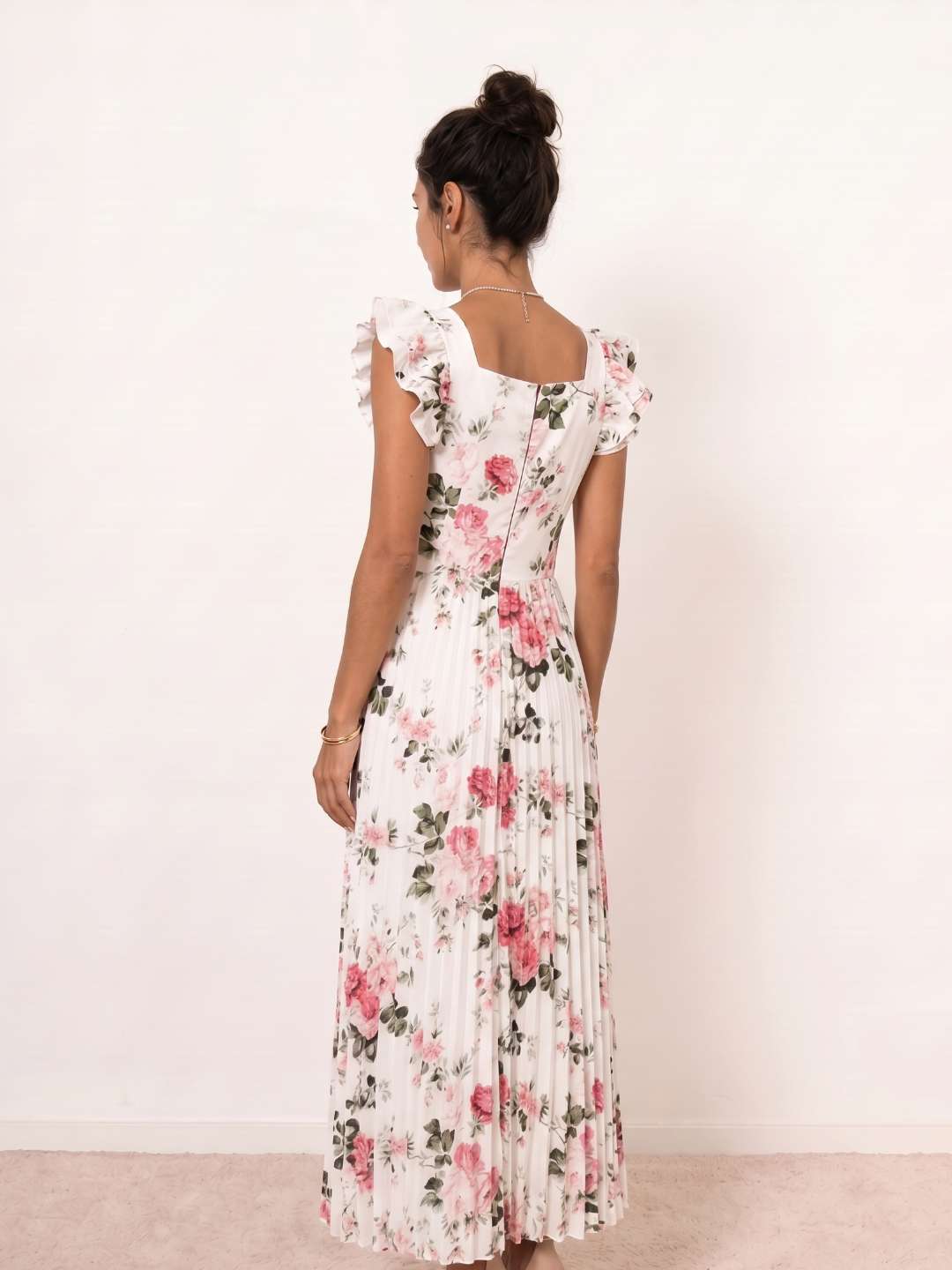 Vestido midi floral plisado con volantes