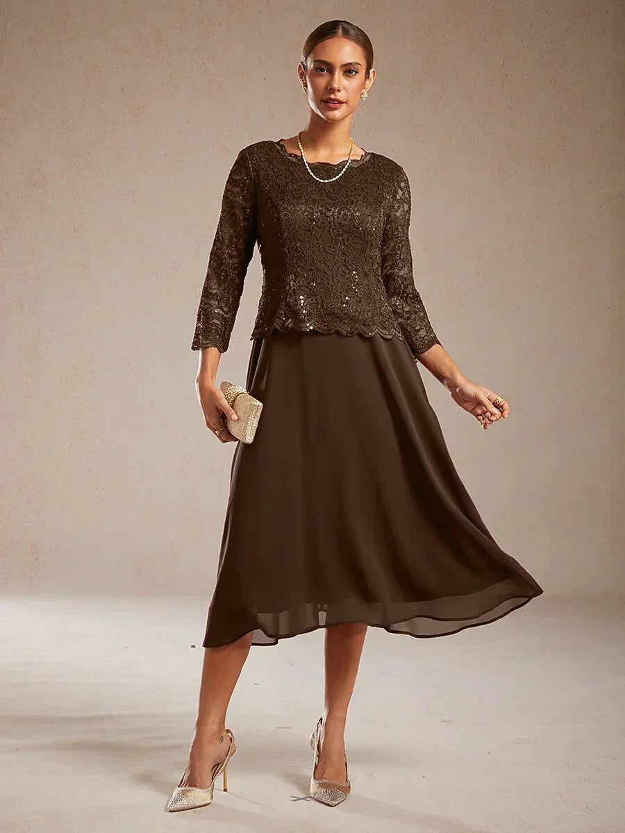 Vestido midi con encaje y manga tres cuartos