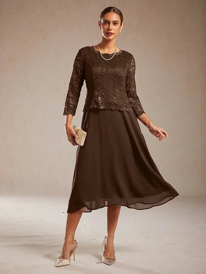 Vestido midi con encaje y manga tres cuartos