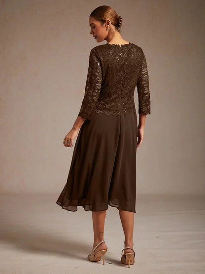 Vestido midi con encaje y manga tres cuartos