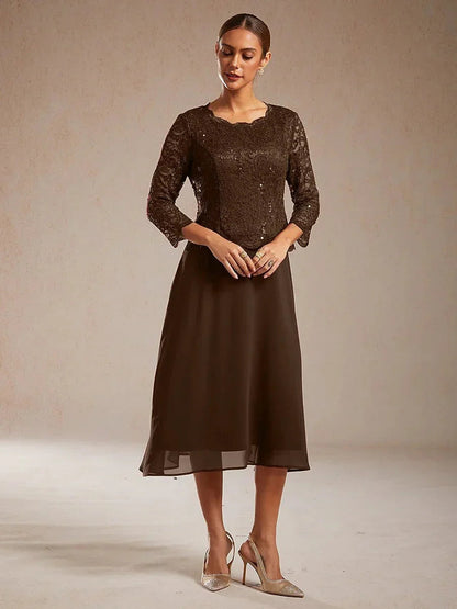 Vestido midi con encaje y manga tres cuartos